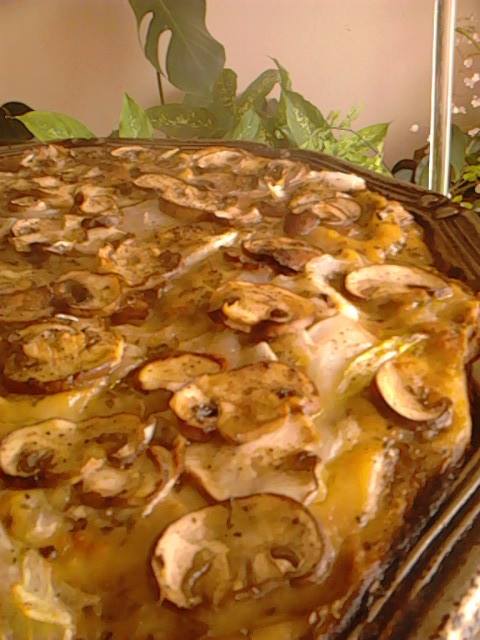 Pizza de cogumelos com creme de curgete